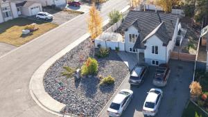 an aerial view of a yard in front of a house at Bright & Cozy Private 1BR Suite in Whitehorse