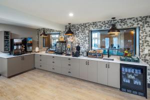 a barber shop with white cabinets and a counter at Pine Grove Resort in Ephraim