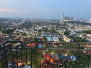 a view of a city from a balcony at Aariz Homestay in Malacca