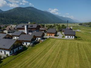 an aerial view of a village with a field at Rattendorf 13A in Rattendorf