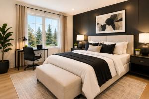 a bedroom with a large bed and a desk at Collin Creek Executive Residences in Plano