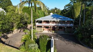 an overhead view of a house with a cross at Flaxton Country Lodge in Flaxton