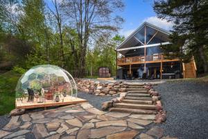 a house with a glass dome in front of it at The Four Seasons Escape in Pocono Lake