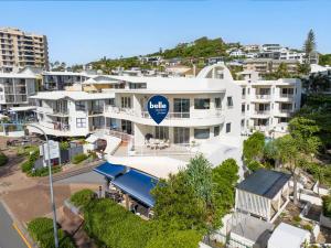an aerial view of a large white apartment building at 6 Baywatch Apartments in Coolum Beach