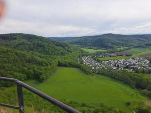 an aerial view of a town in a green field at Wölkchen, Pension mit Gemeinschaftsbädern in Simmerath