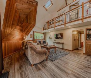 a living room with a couch and a table at Gateway to Glacier in Columbia Falls