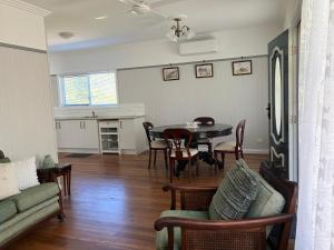 a living room with a table and chairs at Casa Tranquilo in Kanighan