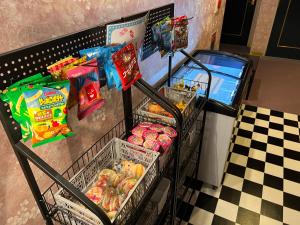 a shopping cart in a grocery store with food at ホテルQ adult only in Kashiwazaki