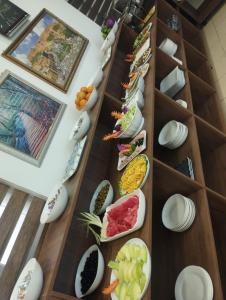 a set of stairs with plates of food on them at فندق سيوار in Erbil