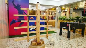 a game room with a ping pong table and a table at Spago Inn-Only for Families & Couples not for Bachelors in Mahabalipuram