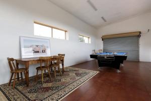 a room with a ping pong table and a pool table at The Hemp House | Table Cape Ocean Views in Table Cape