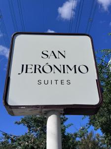 a sign that reads san jeremyzone suites at San Jeronimo Suites in Monterrey