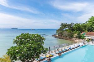 an infinity pool overlooking the ocean at a resort at Centara Villas Phi Phi Island in Phi Phi Islands