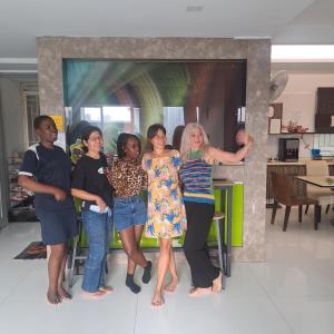 a group of women standing in a living room at Female Hostel wakakapacker in Kuala Lumpur +29 photos