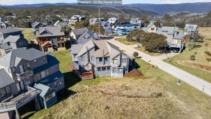 an aerial view of a residential neighborhood with houses at Freedom in Dinner Plain