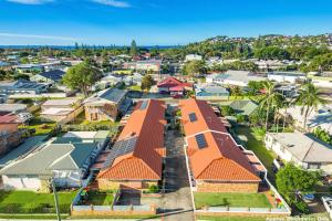 an overhead view of a small town with houses at Tranquility Place in Evans Head