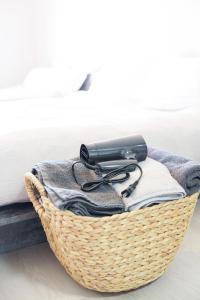 a black hair dryer sitting on top of a basket at Bears Building in Kumamoto