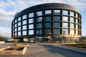 a large building with a lot of windows at STAGES HOTEL Prague, a Tribute Portfolio Hotel in Prague