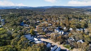 an aerial view of a home in a forest at Snowgums 10 in Dinner Plain