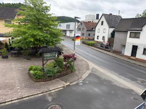 a street with a sign on the side of the road at Ferienwohnung Adenau in Adenau