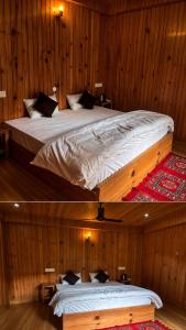 a large bed in a room with wooden walls at KOKILARIVERSONGHomesaty in Banjār +3 photos