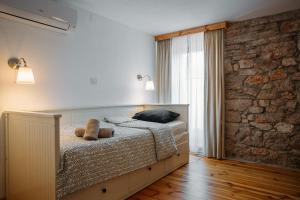 Katil atau katil-katil dalam bilik di Charming old stone house