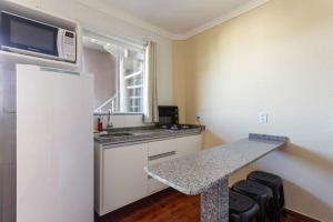 A cozinha ou cozinha compacta de Residencial Gralha Azul