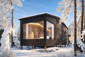 a cabin in the snow with a window at ALVA Resort in Rovaniemi +4 photos