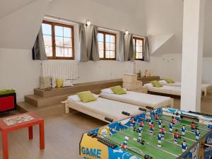 a room with two beds and a lego table at Villa Las tres Mares 6826 in Noja