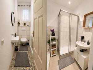 a bathroom with a toilet and a sink at Bright and Elegant Private Room in Dresden