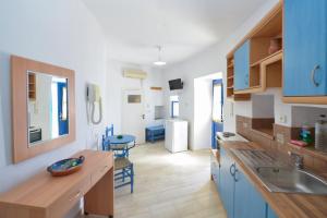 Kuchyň nebo kuchyňský kout v ubytování Windmill Villas