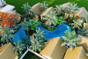 an aerial view of a resort with a swimming pool at Mai Homestay in Ninh Binh
