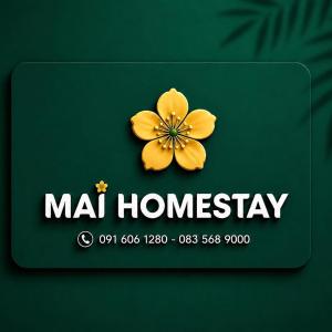 a sign for a mald homay with a yellow flower at Mai Homestay in Ninh Binh +1 photo