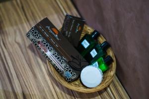 a basket filled with medicines on a table at Hotel Cafe Sahariano in Smara