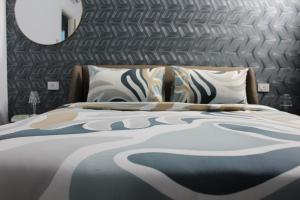 a bedroom with a large bed with a large mirror at Luxury SPA Villa Cefalù in Campofelice di Roccella +41 photos