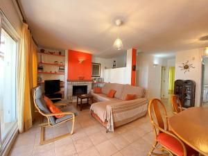 a living room with a couch and a table at Playa de Baria I in Vera