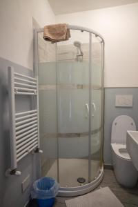 a shower stall in a bathroom with a toilet at Casa di Alfredo Affittacamere in Siena +54 photos