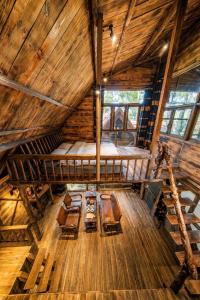 an overhead view of a room in a wooden cabin at Sóc House Măng Đen in Kon Plong +212 photos