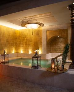 a large bathroom with a large tub in a room at Hotel Metropole Venezia in Venice