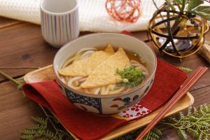 a bowl of soup with tortilla chips on a table at HOTEL K's L Adult only in Urigōchō