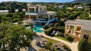 an aerial view of a villa with a swimming pool at Villa Pelagos in Koutsounari