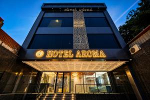 a hotel amana building with a sign that reads hotel roma at Hotel Aroma in Mathura