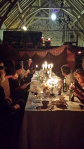 a group of people sitting around a long table at Le Petit Savriere B&B in Tronget +32 photos