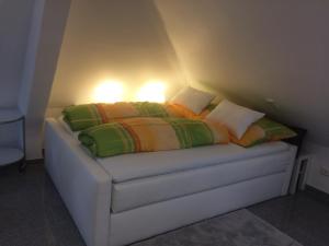 Кровать или кровати в номере Apartment Deluxe Baden-Baden