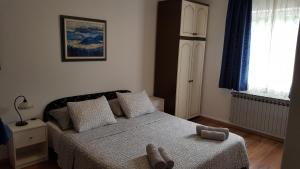 Postel nebo postele na pokoji v ubytování Guest House Jole