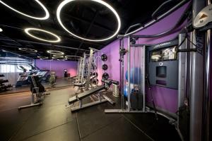 a gym with rows of tread machines at Wink Hai Phong Centre, Unscripted by Hyatt - 24 Hours stay in Hai Phong +49 photos