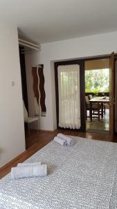 Postel nebo postele na pokoji v ubytování Guest House Jole