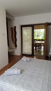 Postel nebo postele na pokoji v ubytování Guest House Jole