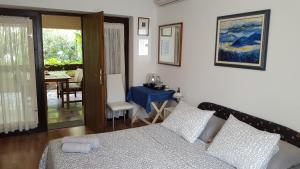 Postel nebo postele na pokoji v ubytování Guest House Jole