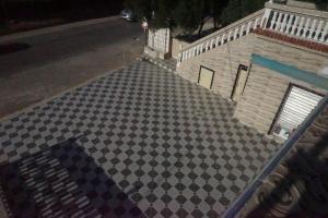 an overhead view of a checkered floor on a building at Bab Akchour in Chefchaouen